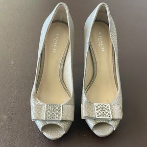 Coach 4 inch platform heels with bow.